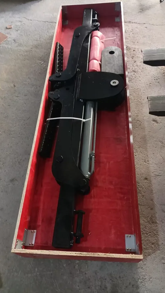 Barra de arrastre automática en huacal de exportación